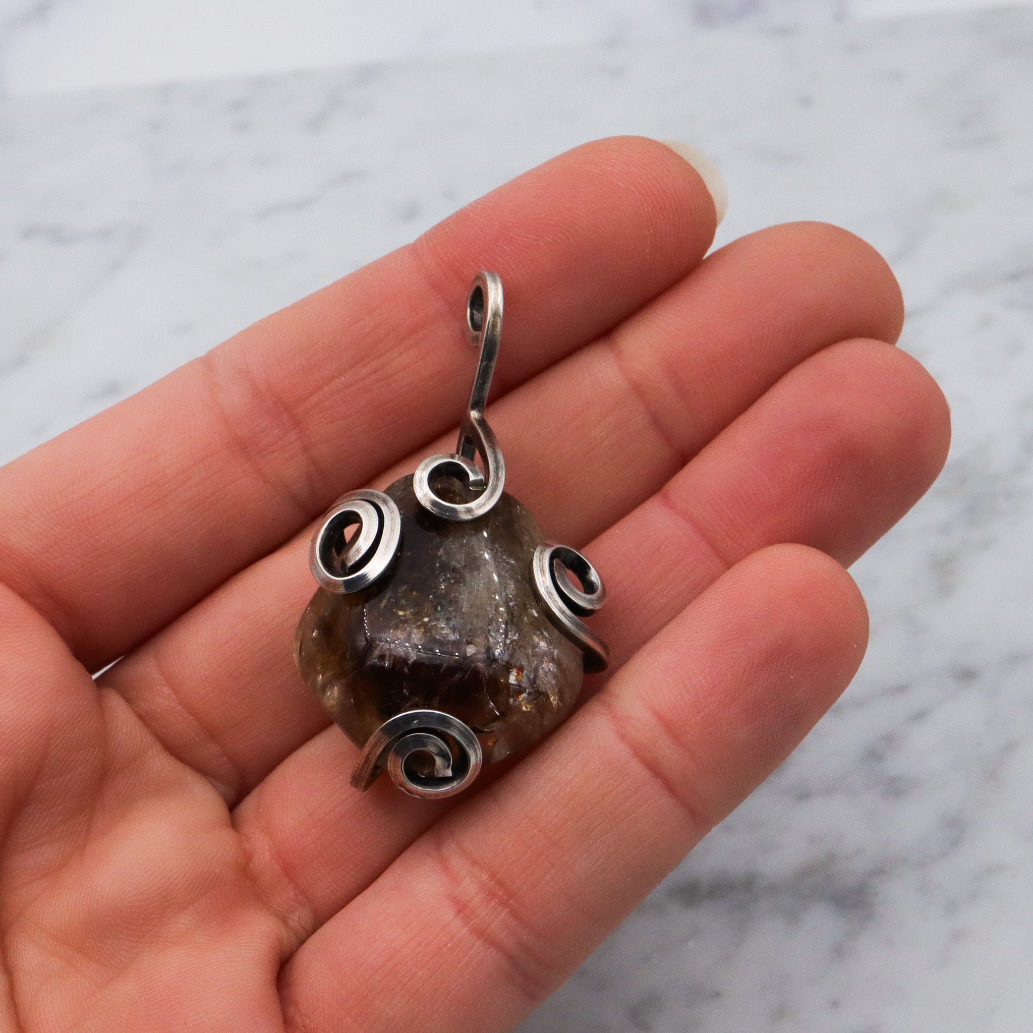 Vintage handmade sterling silver wrapped quartz pendant